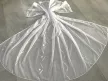Kész luxus függöny fehér alapon ezüst karikás hullámos 300x150cm