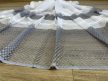 Kész függöny fehér alapon szürke lyukacsos csíkos 500x250cm
